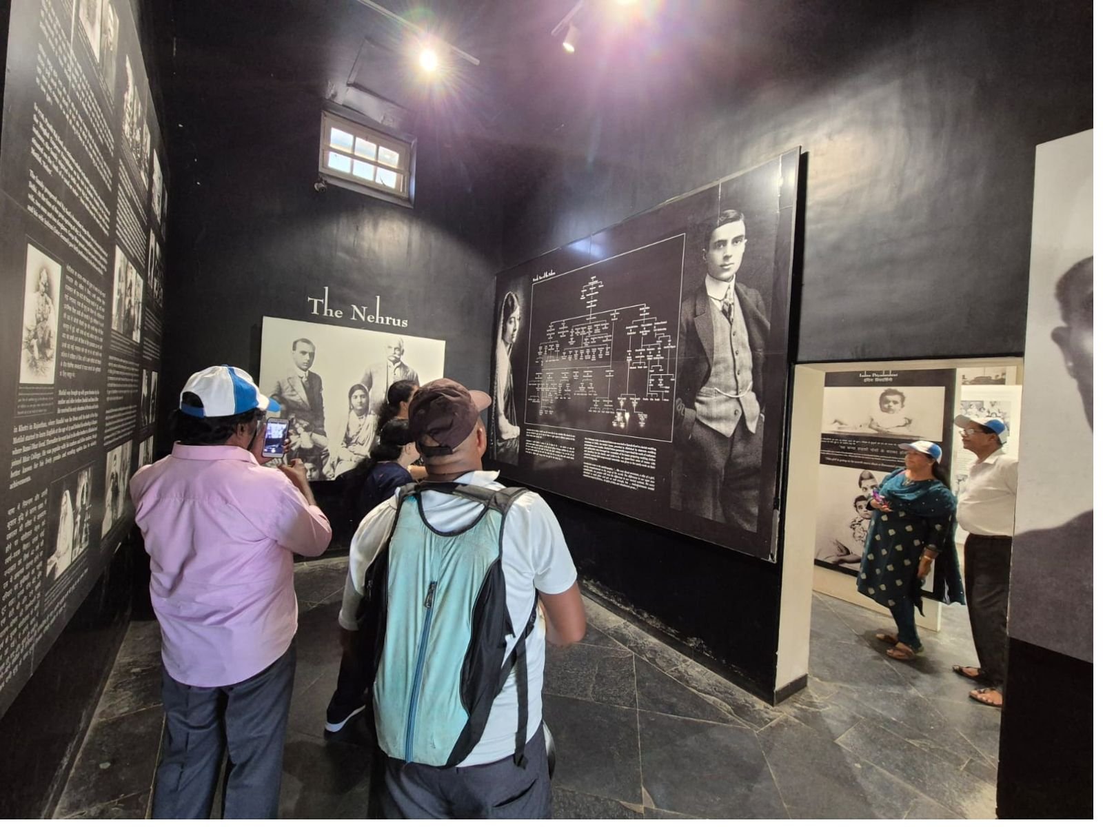 Tour group learning about the Nehru family legacy inside Anand Bhawan Museum in Prayagraj, Uttar Pradesh